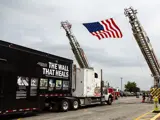 A picture of the Wall that Heals with an American Flag